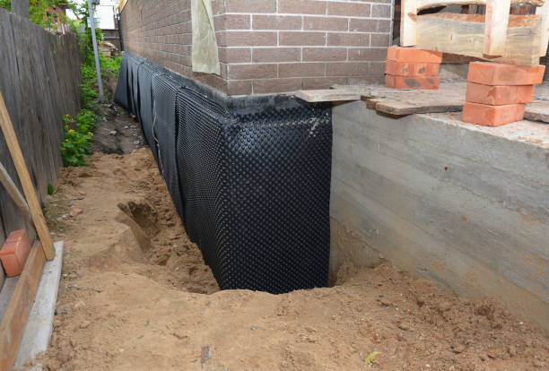Happy homeowners after waterproofing job in Waynesfield
